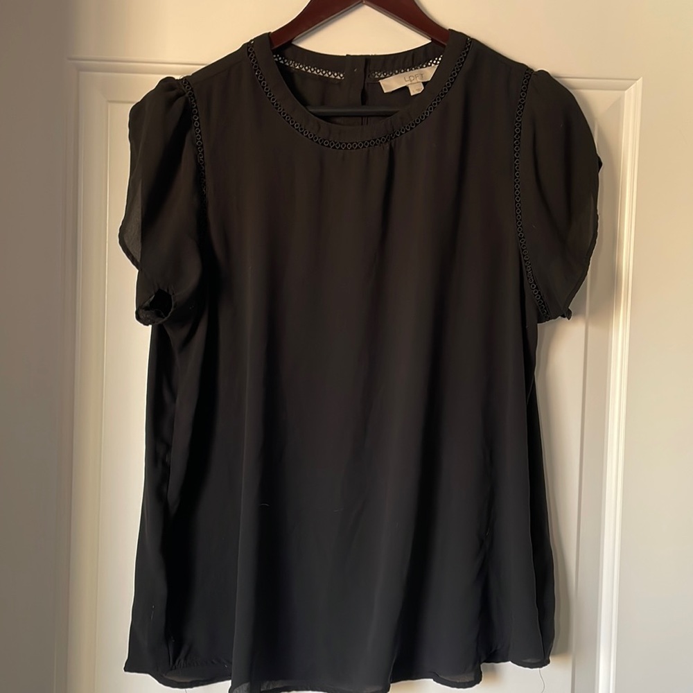 Black blouse from Loft size L. Flowey with cute design at the neck and shoulder
